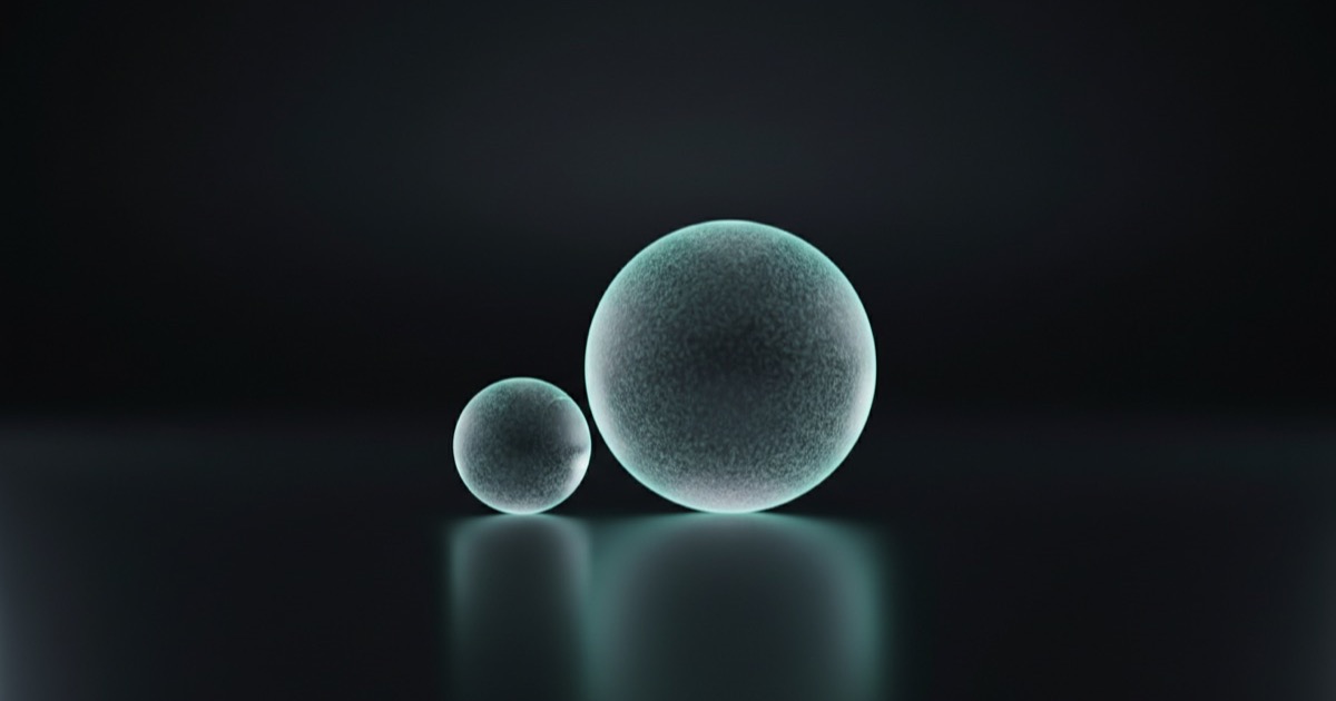 MPV: small and large frosted glass spheres on a dark surface